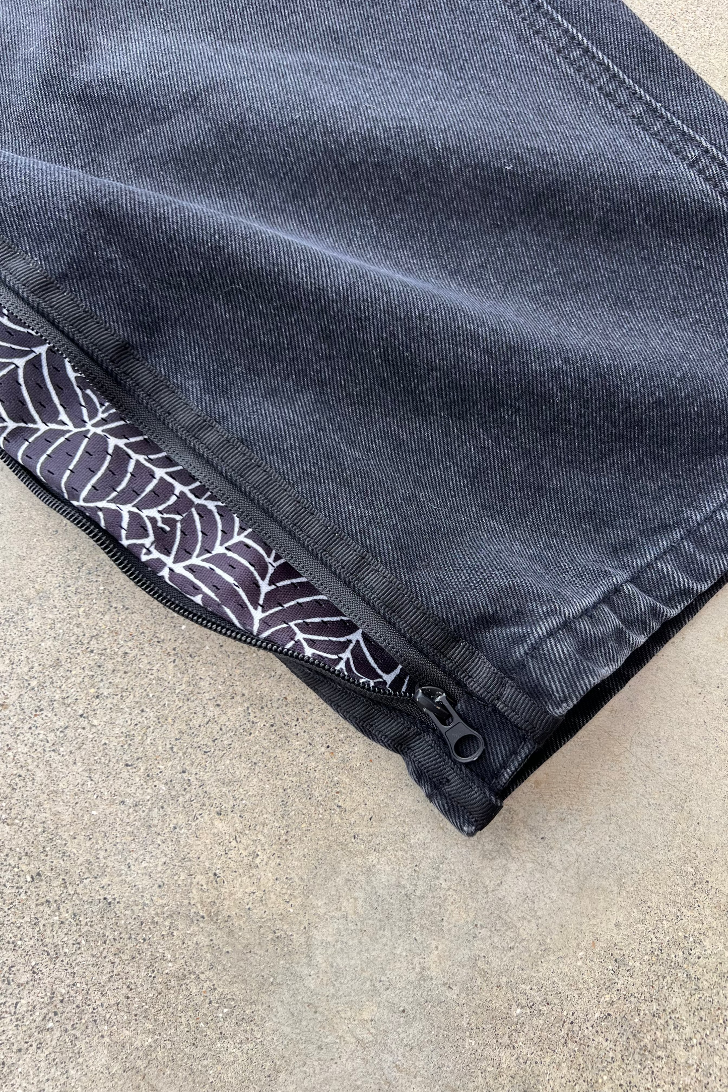 Webstate spiderweb denim on skater - airflow flexible skate streetwear jeans