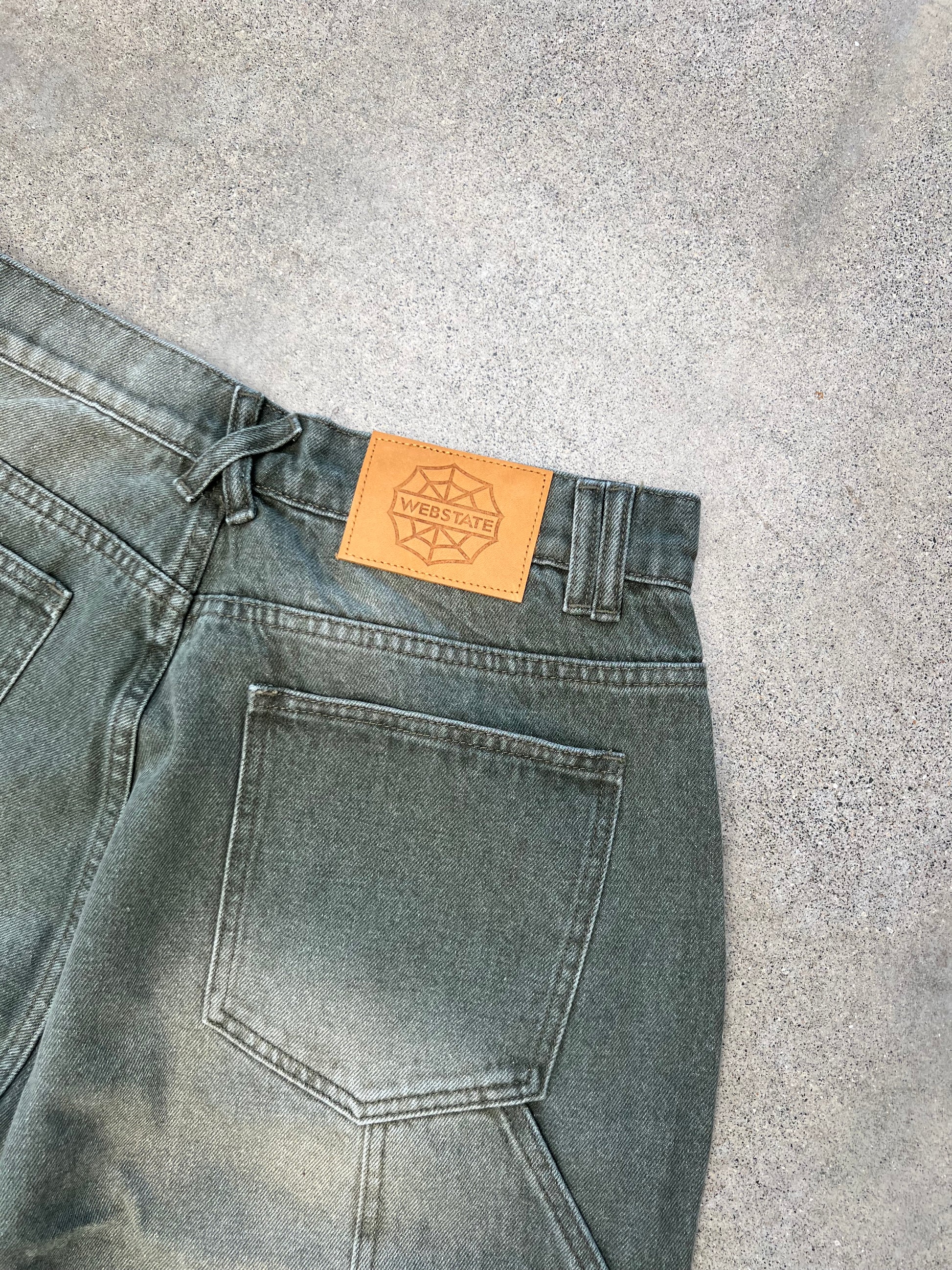 Webstate green reinforced knee jeans side - functional skate denim side view