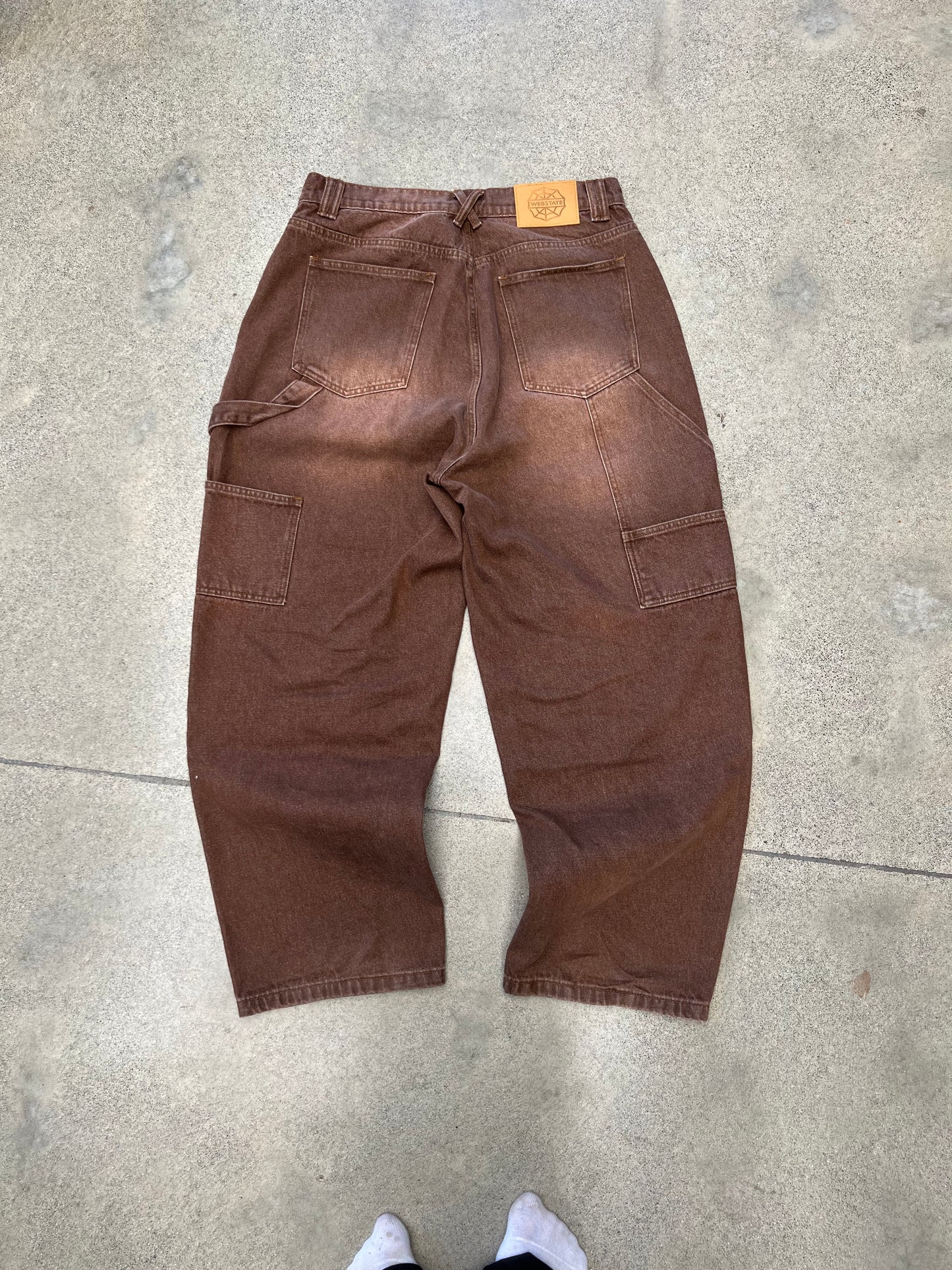 Webstate brown double knee jeans on skater - functional reinforced skate denim