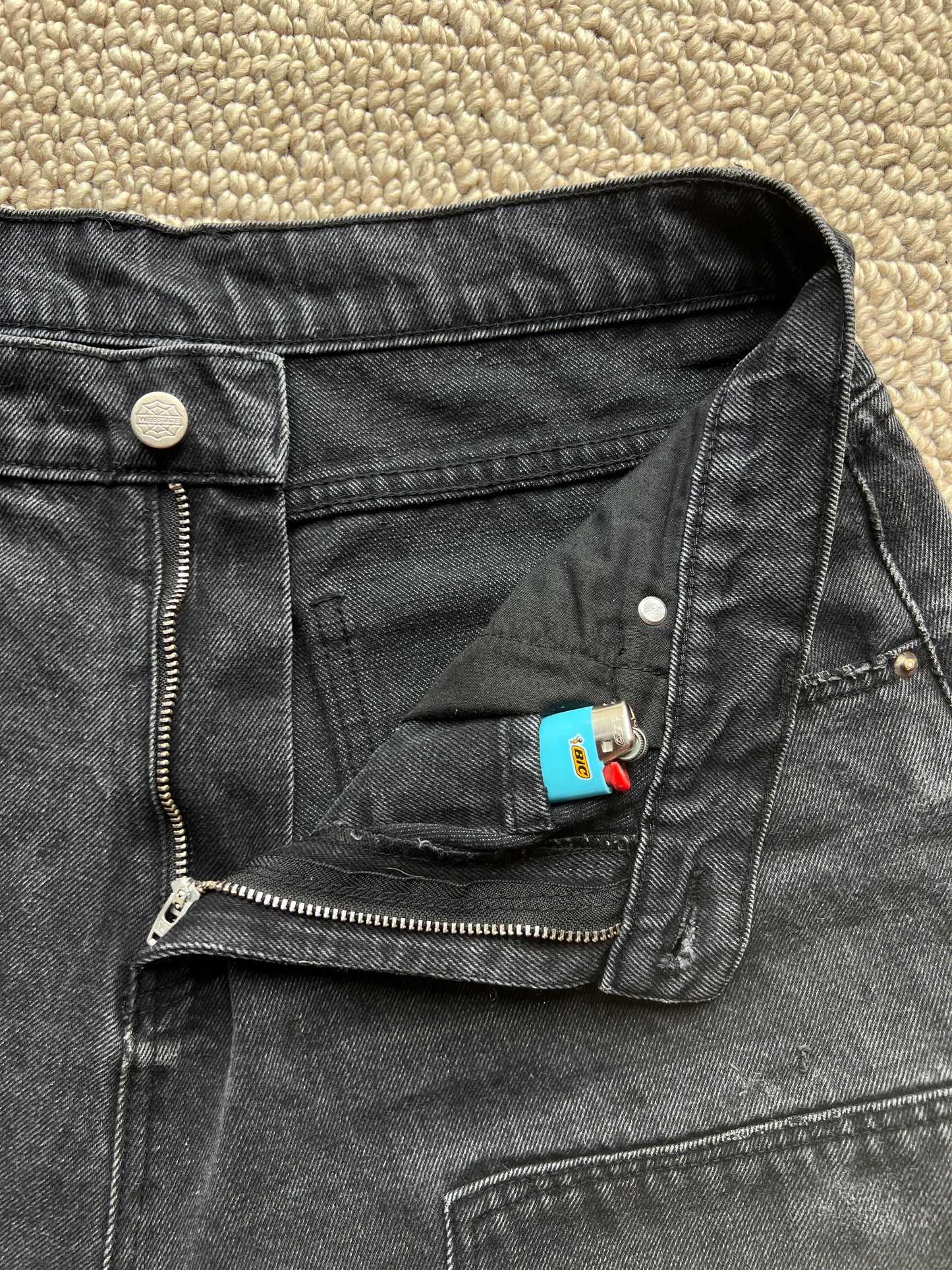 Webstate black double knee jorts detail - reinforced knee stitching black jorts