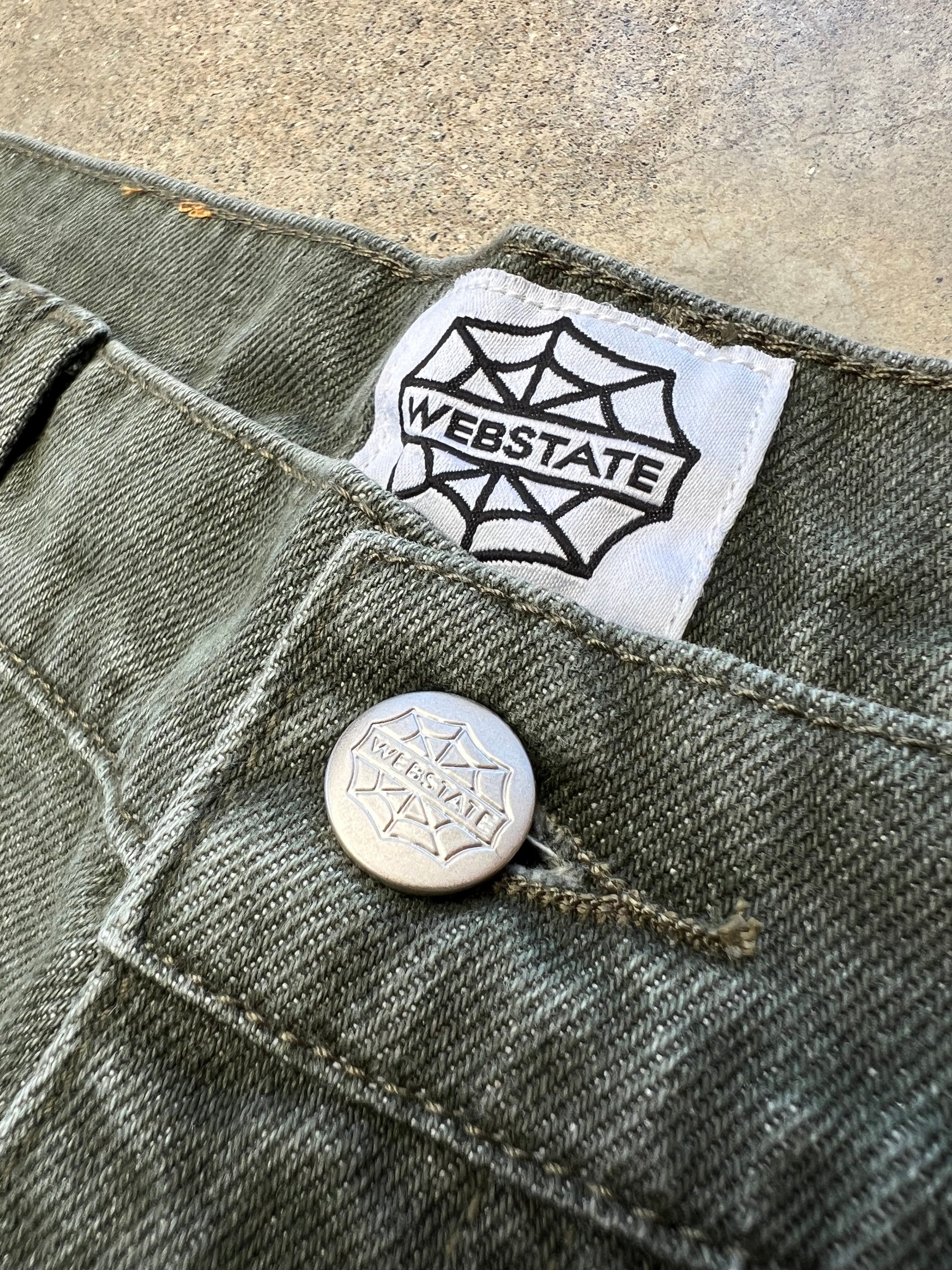 Webstate double knee green detail - reinforced knee stitching green denim
