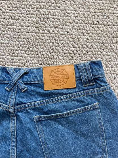 Webstate blue double knee jorts on skater - functional reinforced skate jorts