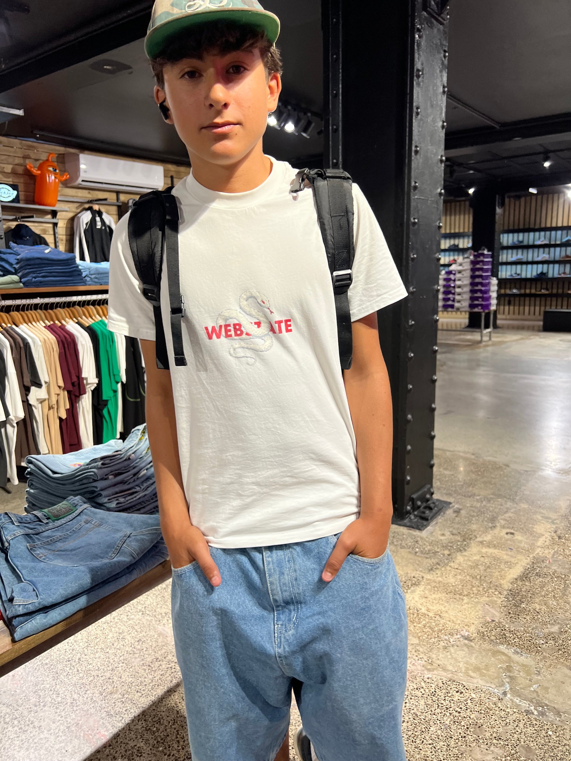 Webstate albino snake tee on skater - bold graphic snake skate streetwear tee
