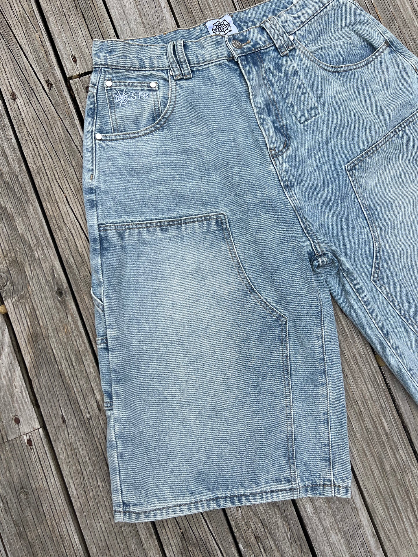 Webstate light blue double knee jorts on skater - functional reinforced skate