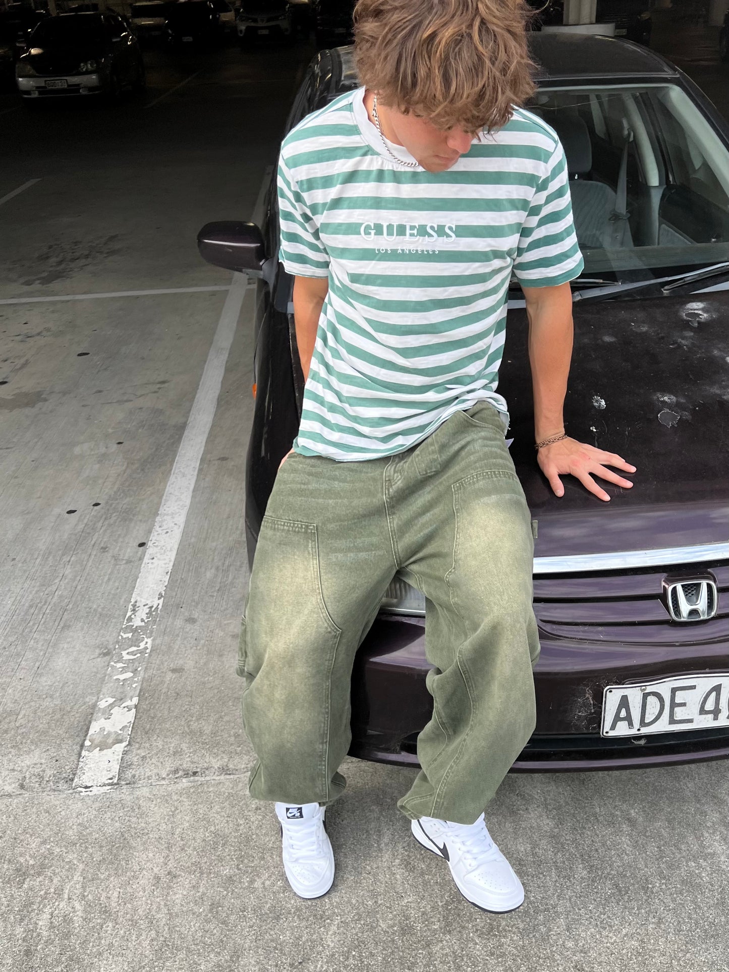 Webstate double knee green jeans close-up - stitching reinforced skate denim